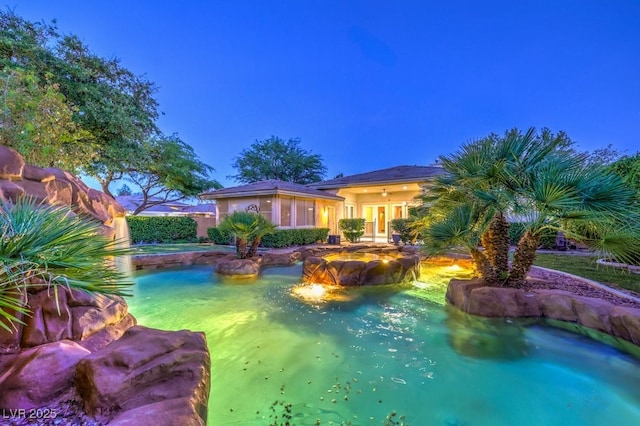10300 Wellside Hill Ave, Las Vegas, NV 89145 - view of pool featuring a pool with connected hot tub and an outdoor fire pit