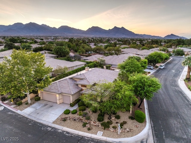 10300 Wellside Hill Ave, Las Vegas, NV 89145 - aerial view at dusk of a mountain view and a residential view