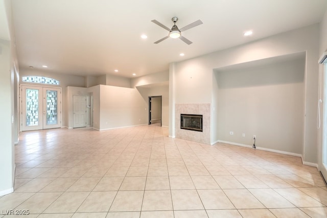 10300 Wellside Hill Ave, Las Vegas, NV 89145 - unfurnished living room with a ceiling fan, recessed lighting, light tile patterned floors, and a tile fireplace