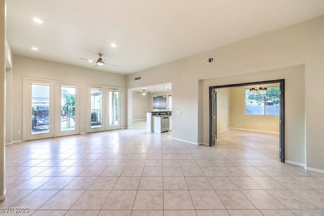 10300 Wellside Hill Ave, Las Vegas, NV 89145 - unfurnished living room with a ceiling fan, light tile patterned flooring, and recessed lighting