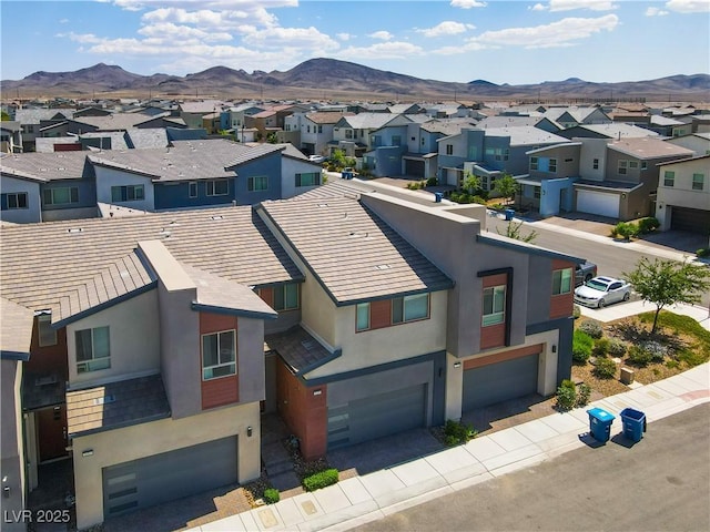 3219 Timorasso Ave, Henderson, NV 89044 - aerial perspective of suburban area with a mountain backdrop