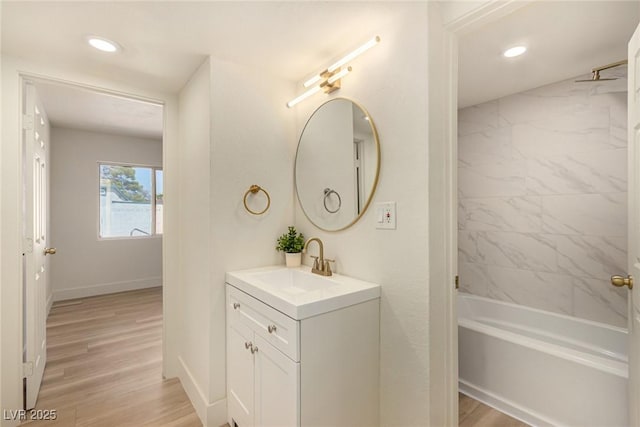 3748 Silent Hill Dr, Las Vegas, NV 89147 - bathroom with vanity, wood finished floors, bathtub / shower combination, and recessed lighting