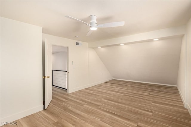 3748 Silent Hill Dr, Las Vegas, NV 89147 - unfurnished room with ceiling fan, light wood-style floors, and vaulted ceiling