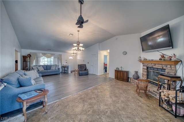 3251 S Parkridge Ave, Pahrump, NV 89048 - living room with lofted ceiling, a fireplace, and a chandelier