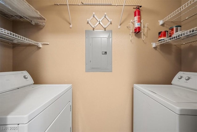 5855 Valley Dr Unit 2130, North Las Vegas, NV 89031 - laundry room with electric panel and washer and clothes dryer