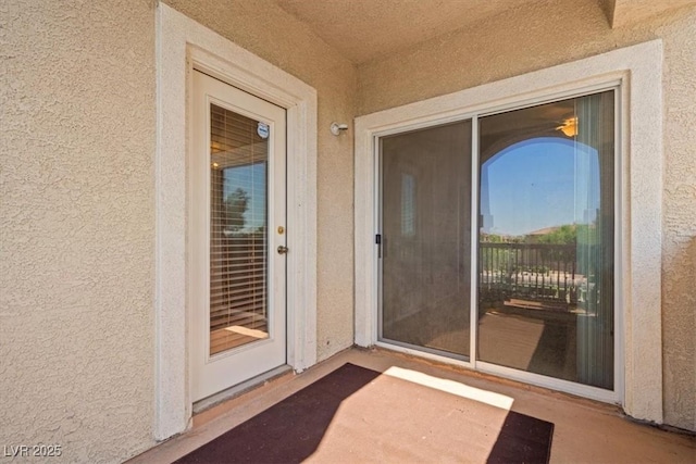 5855 Valley Dr Unit 2130, North Las Vegas, NV 89031 - property entrance featuring stucco siding