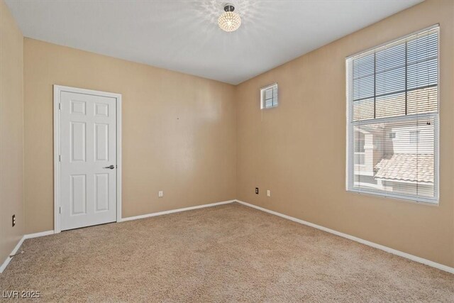 5855 Valley Dr Unit 2130, North Las Vegas, NV 89031 - carpeted empty room with baseboards