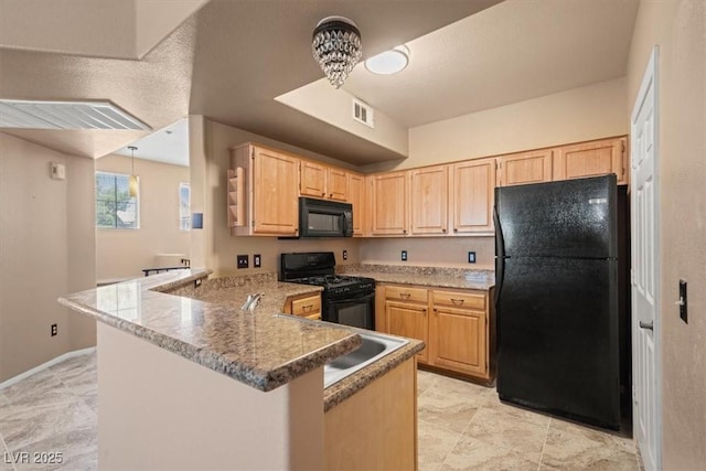 5855 Valley Dr Unit 2130, North Las Vegas, NV 89031 - kitchen with black appliances, light brown cabinets, a peninsula, and light tile patterned floors