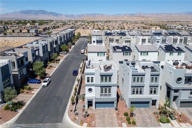 8175 Caldera Creek St, Las Vegas, NV 89113 - aerial perspective of suburban area featuring a mountainous background