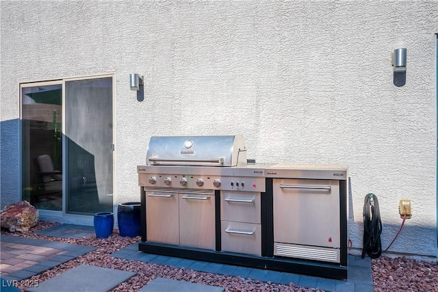 8175 Caldera Creek St, Las Vegas, NV 89113 - view of patio with an outdoor kitchen