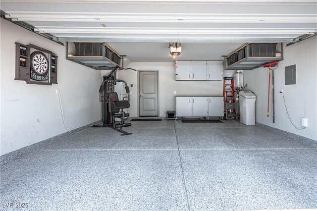 8175 Caldera Creek St, Las Vegas, NV 89113 - garage featuring electric panel and a garage door opener