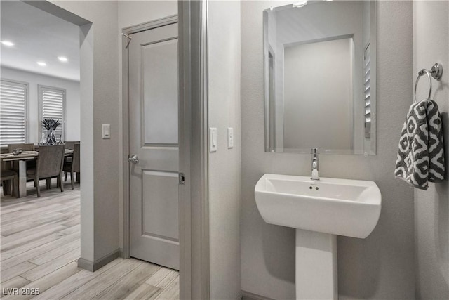 8175 Caldera Creek St, Las Vegas, NV 89113 - bathroom featuring wood finished floors and recessed lighting
