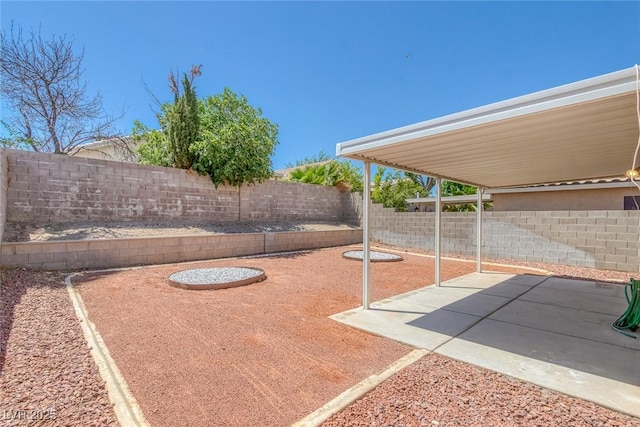 3741 Cactus Wheel Ct, Las Vegas, NV 89129 - fenced backyard featuring a patio