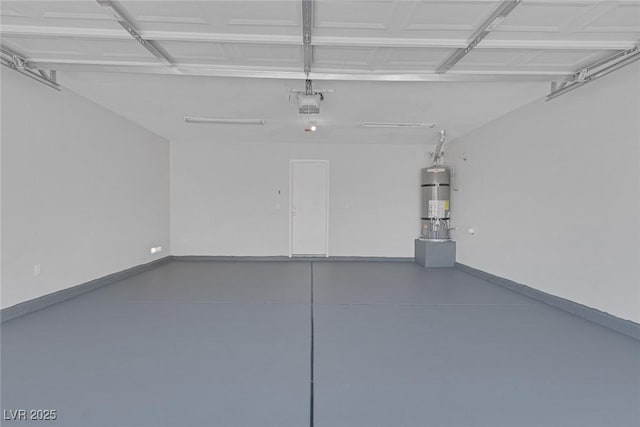3741 Cactus Wheel Ct, Las Vegas, NV 89129 - garage featuring secured water heater and a garage door opener