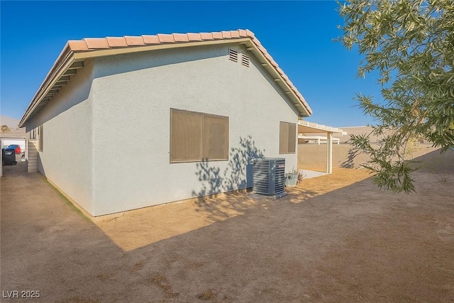 2421 Sunrise Springs Ct, North Las Vegas, NV 89031 - view of home's exterior with stucco siding and a patio