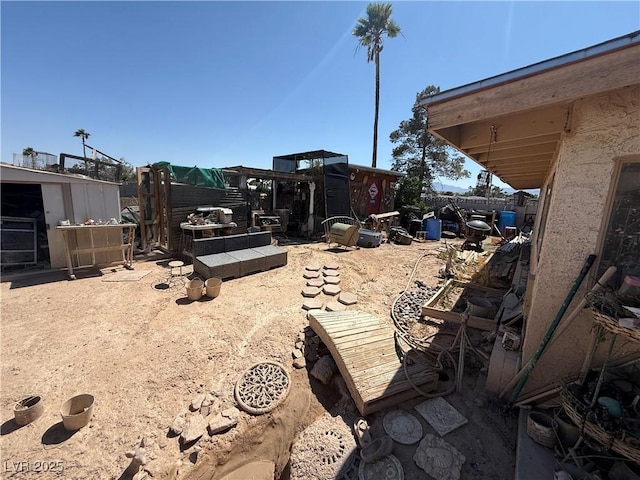 6271 Explorer Dr, Las Vegas, NV 89103 - view of yard featuring an outbuilding