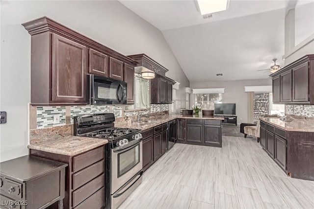 1761 Summerwood Cir, Henderson, NV 89012 - kitchen featuring black appliances, vaulted ceiling, dark brown cabinets, a peninsula, and decorative backsplash