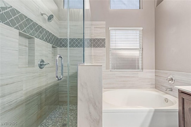 1761 Summerwood Cir, Henderson, NV 89012 - bathroom with a garden tub, a stall shower, and vanity
