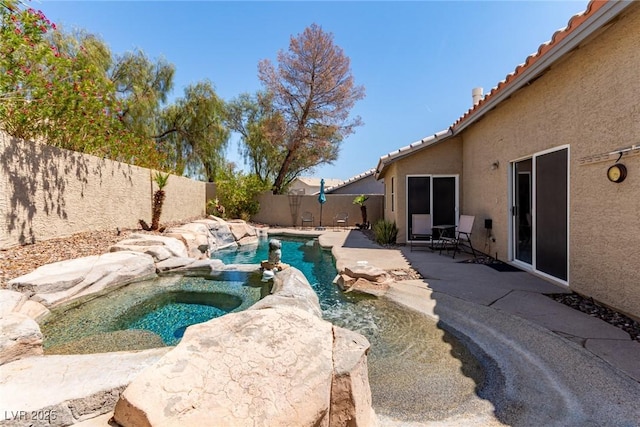 1761 Summerwood Cir, Henderson, NV 89012 - view of swimming pool featuring a fenced backyard, a pool with connected hot tub, and a patio area