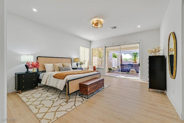 328 Hedgehope Dr, Las Vegas, NV 89183 - bedroom featuring access to exterior, light wood-type flooring, and recessed lighting