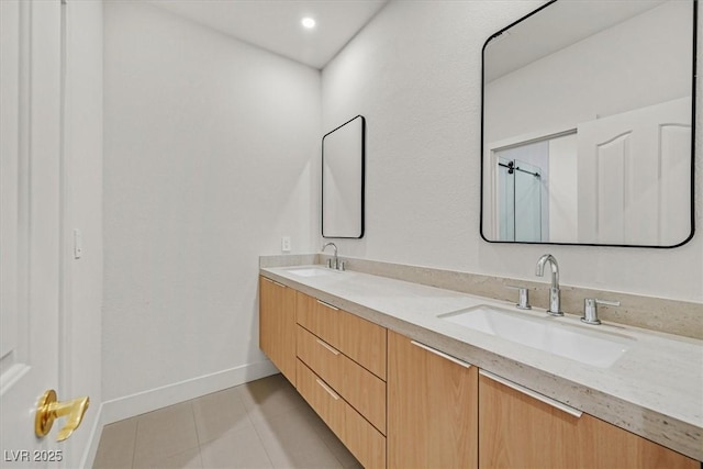 328 Hedgehope Dr, Las Vegas, NV 89183 - bathroom featuring double vanity and tile patterned floors
