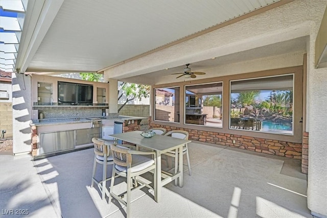 328 Hedgehope Dr, Las Vegas, NV 89183 - view of patio / terrace featuring area for grilling, outdoor dining space, and ceiling fan