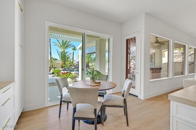 328 Hedgehope Dr, Las Vegas, NV 89183 - dining room featuring light wood-style flooring and baseboards