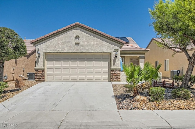 7717 Pine Warbler Way N, Las Vegas, NV 89084 - single story home with a garage, concrete driveway, a tiled roof, stucco siding, and stone siding