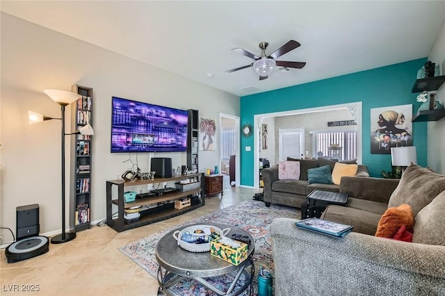 7717 Pine Warbler Way N, Las Vegas, NV 89084 - tiled living room with ceiling fan and baseboards