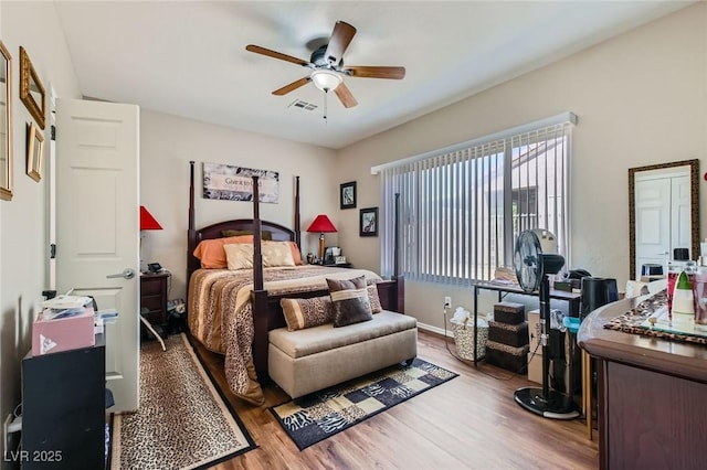 7717 Pine Warbler Way N, Las Vegas, NV 89084 - bedroom with wood finished floors and ceiling fan