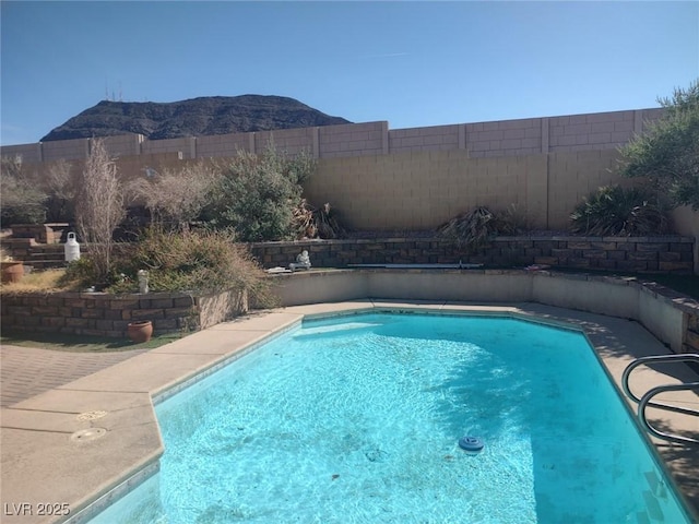 424 Wright Way, Henderson, NV 89015 - view of swimming pool featuring a fenced backyard and a mountain view