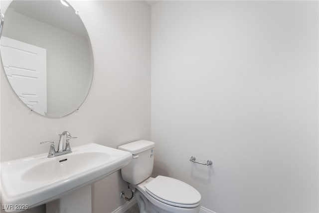 1801 Flycatch St, Las Vegas, NV 89138 - half bathroom featuring baseboards