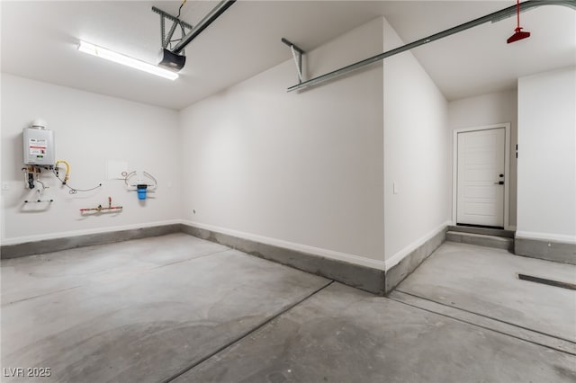 1801 Flycatch St, Las Vegas, NV 89138 - garage featuring a garage door opener and water heater