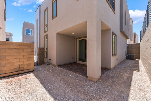 1801 Flycatch St, Las Vegas, NV 89138 - back of house featuring stucco siding and a patio area