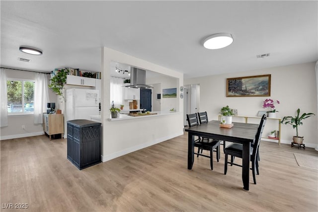3509 Navajo Way, Las Vegas, NV 89108 - dining room featuring light wood-style floors