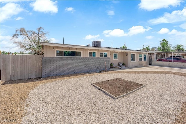 3509 Navajo Way, Las Vegas, NV 89108 - back of house with a patio, brick siding, and solar panels
