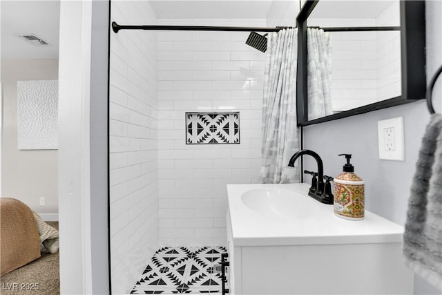 3509 Navajo Way, Las Vegas, NV 89108 - bathroom featuring vanity and a tile shower
