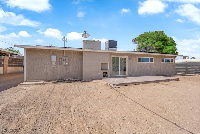 3509 Navajo Way, Las Vegas, NV 89108 - rear view of house featuring a patio and a chimney