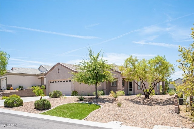2545 Divine Sky Dr, Henderson, NV 89044 - single story home featuring a garage, stucco siding, and concrete driveway
