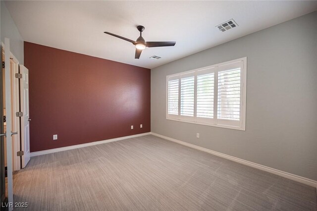 2545 Divine Sky Dr, Henderson, NV 89044 - unfurnished room featuring a ceiling fan and carpet floors