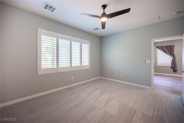 2545 Divine Sky Dr, Henderson, NV 89044 - empty room with a ceiling fan, a smoke detector, and light wood-style flooring