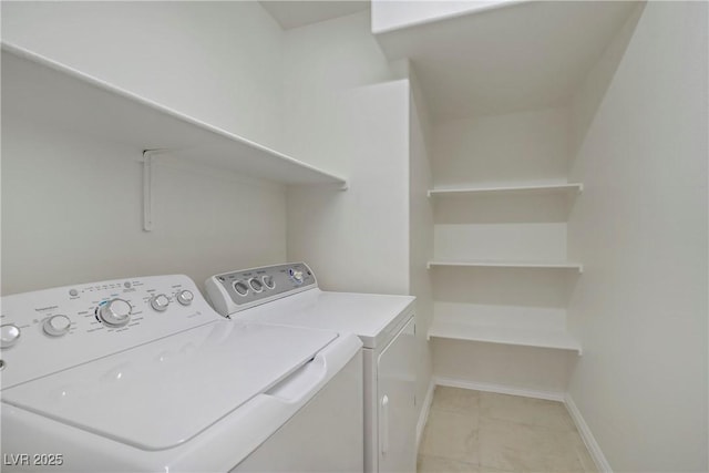10062 Aspen Rose St Unit 103, Las Vegas, NV 89183 - laundry area with washer and dryer and baseboards