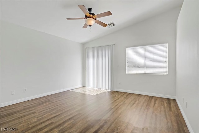 10062 Aspen Rose St Unit 103, Las Vegas, NV 89183 - empty room featuring lofted ceiling, a ceiling fan, and wood finished floors