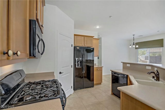 10062 Aspen Rose St Unit 103, Las Vegas, NV 89183 - kitchen featuring black appliances, light countertops, light tile patterned floors, decorative light fixtures, and light brown cabinets