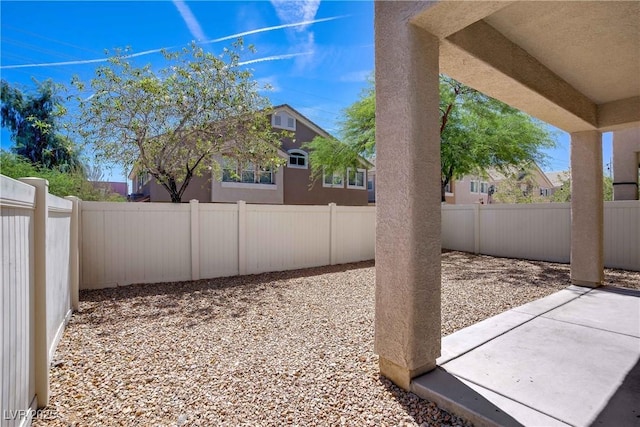 10062 Aspen Rose St Unit 103, Las Vegas, NV 89183 - fenced backyard featuring a patio area