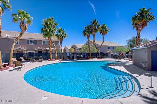 10062 Aspen Rose St Unit 103, Las Vegas, NV 89183 - community pool with a patio area and a residential view
