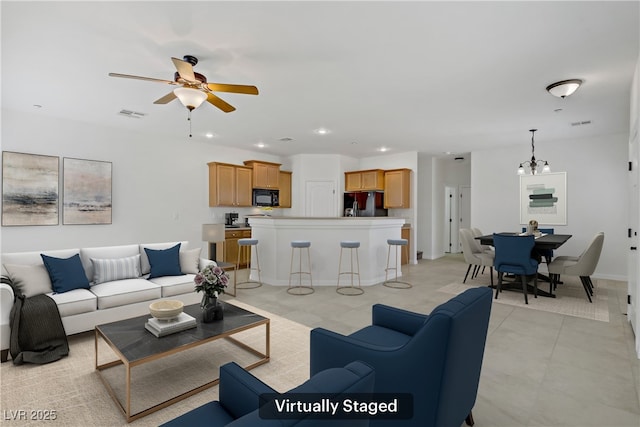 10062 Aspen Rose St Unit 103, Las Vegas, NV 89183 - living area featuring a ceiling fan, recessed lighting, and light tile patterned floors