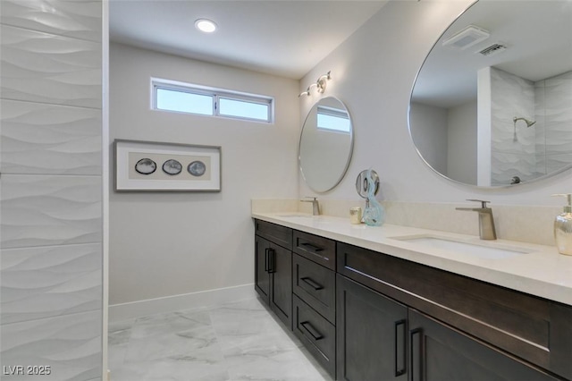 9800 Rosamond Dr, Las Vegas, NV 89134 - bathroom with double vanity, marble finish flooring, and a shower