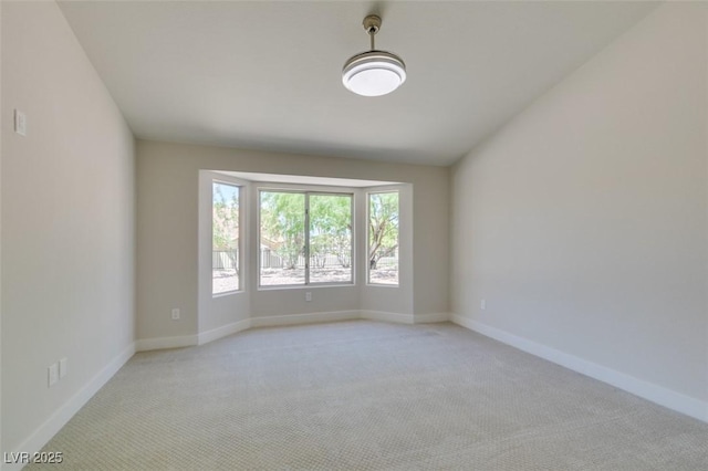 9800 Rosamond Dr, Las Vegas, NV 89134 - spare room with light colored carpet and baseboards