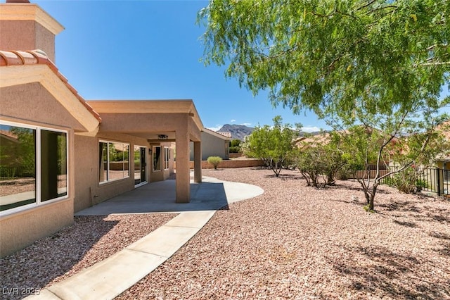 9800 Rosamond Dr, Las Vegas, NV 89134 - view of yard with a patio area